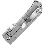 Kansept Reedus Framelock gray titanium folding knife with satin blade, angled view.