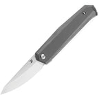 Kansept Integra Framelock folding knife with satin blade and gray titanium handle, angled view.