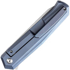 Kansept Integra Framelock blue handle with dark stonewashed blade, angled view.