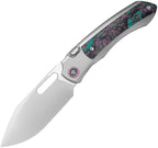 Remette Orca button framelock folding knife with M390 blade and gray titanium handle with Jazzy Camo Carbon inlay (RMTORCAJY)